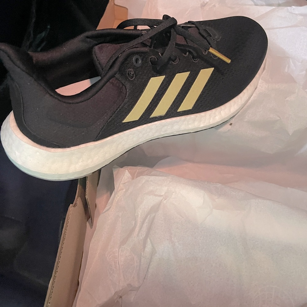 Black with gold trim size 11 very light brand new in box